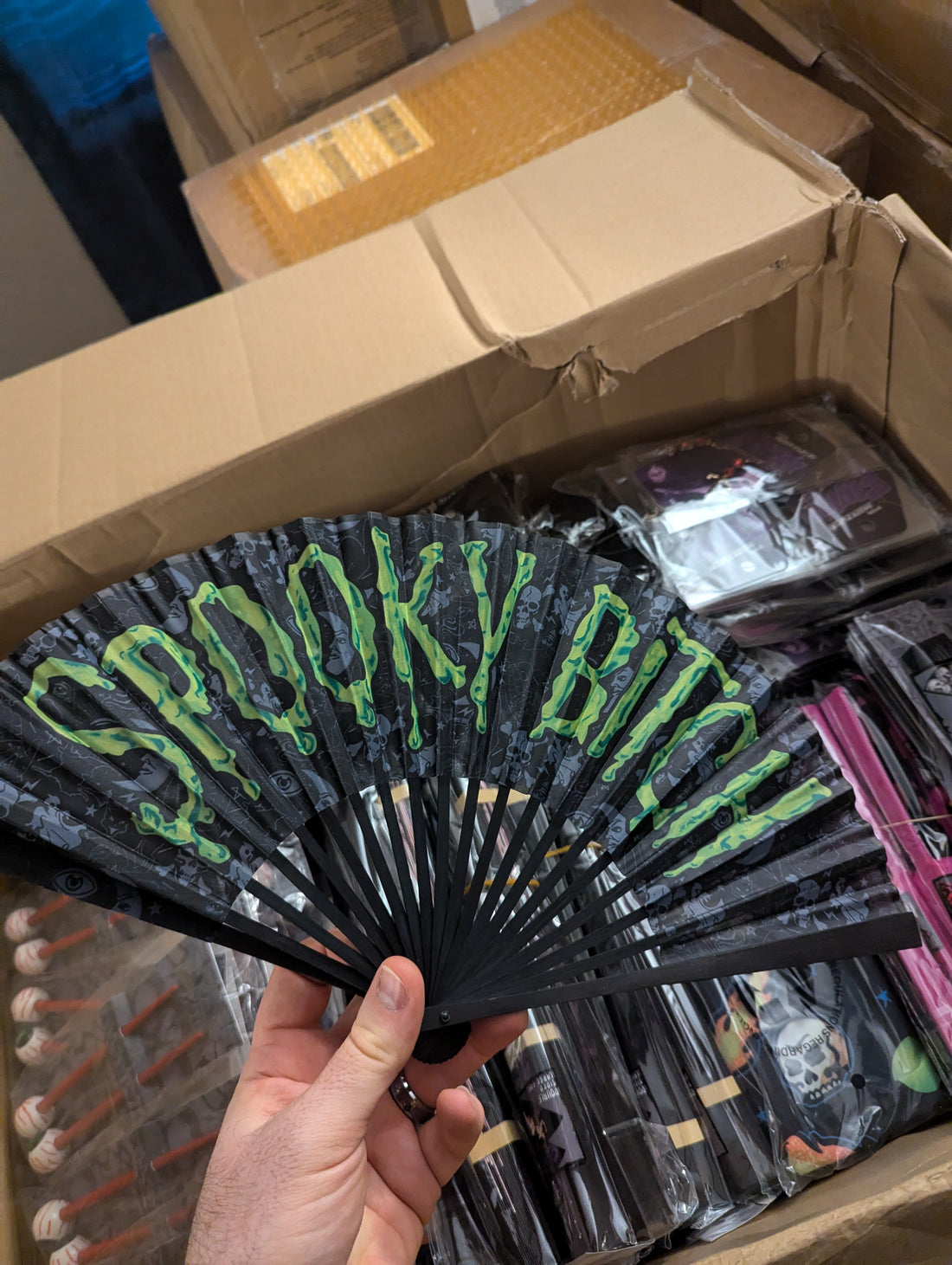 Spooky Bitch 16" Handheld fan available for purchase at Nerd Imports