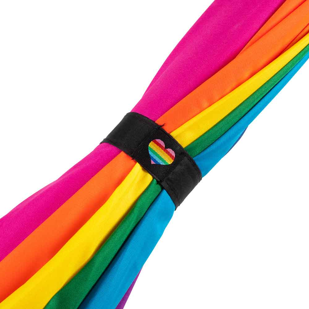 Heart-shaped rainbow pride umbrella closeup of the strap with rainbow heart