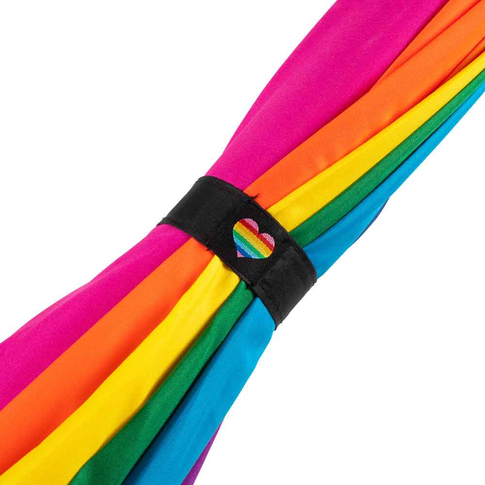 Heart-shaped rainbow pride umbrella closeup of the strap with rainbow heart