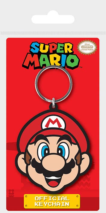 Super Mario keychain on a red packaging with 'Official Keychain' text.  Package also shows official Nintendo seal.  Mario's face is about 2 inches in side and is made of PVC.
