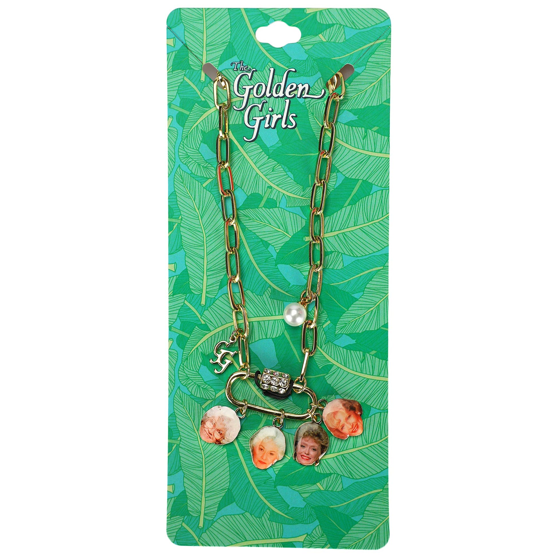Golden Girls charm pendants necklace with 18 inch chain and 3 inch extender. Shown on the original cardboard insert. Pendant has a charm of Sophia, Dorothy, Blanche and Rose.