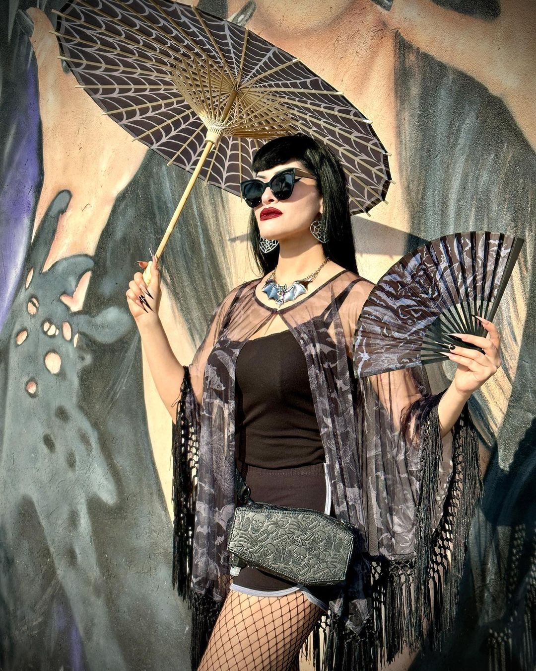 Our gothic fanny pack with embossed design is the perfect small travel bag for spooky vibes.