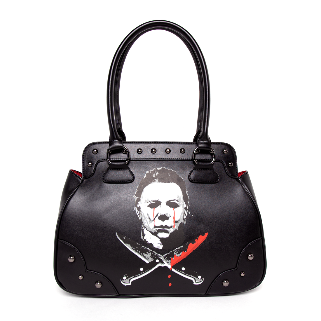 Front of black Michael Myers handbag featuring Halloween II bleeding eyes design with crossed knives graphic