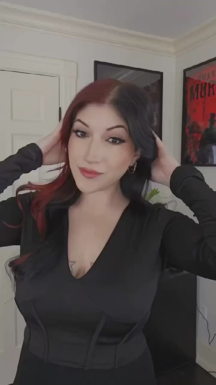 ladyparadoxx is wearing our official Elvira dagger jewelry