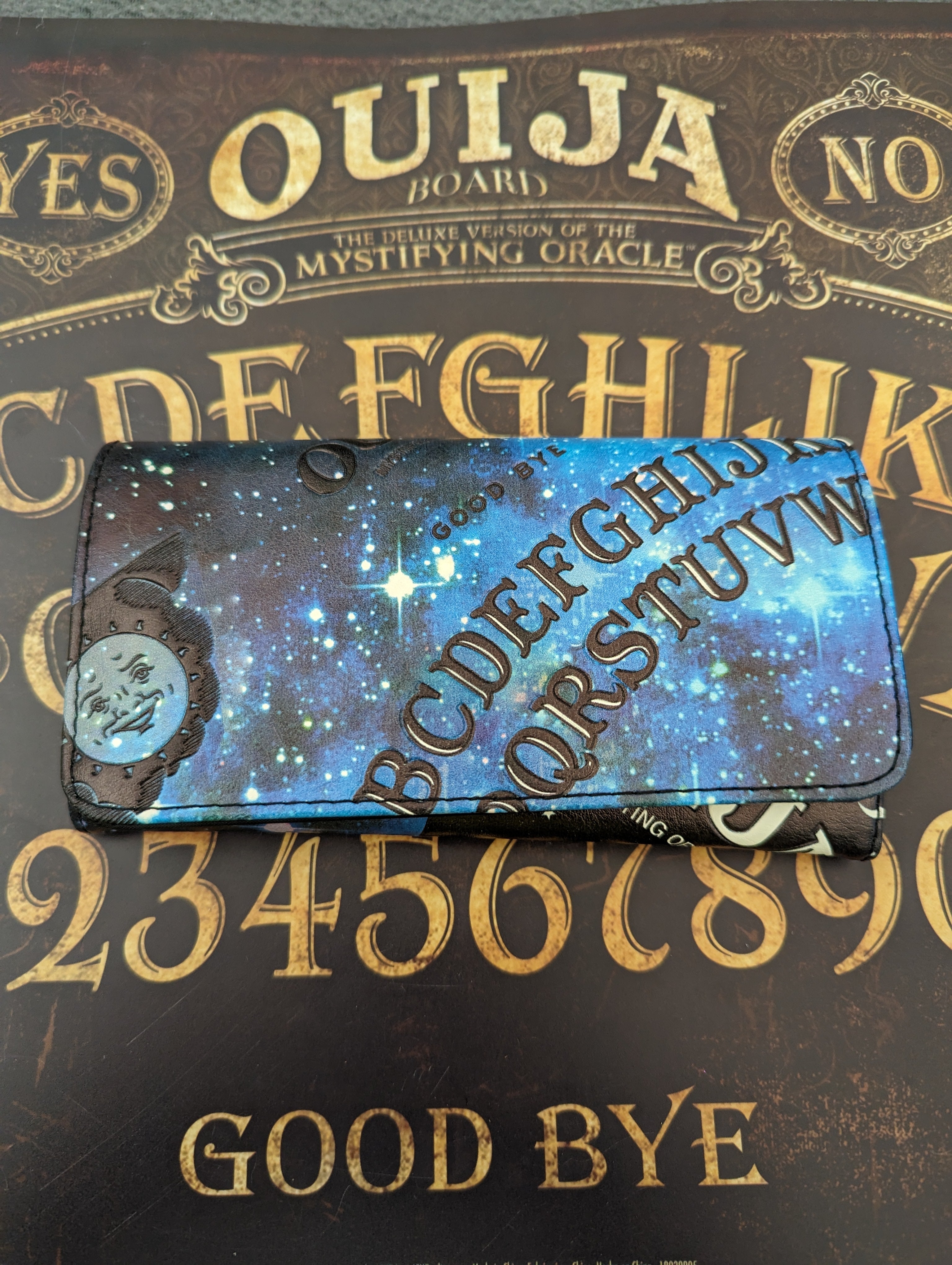 Official Ouija Women's Flap Wallet with Blue Galaxy Space Print