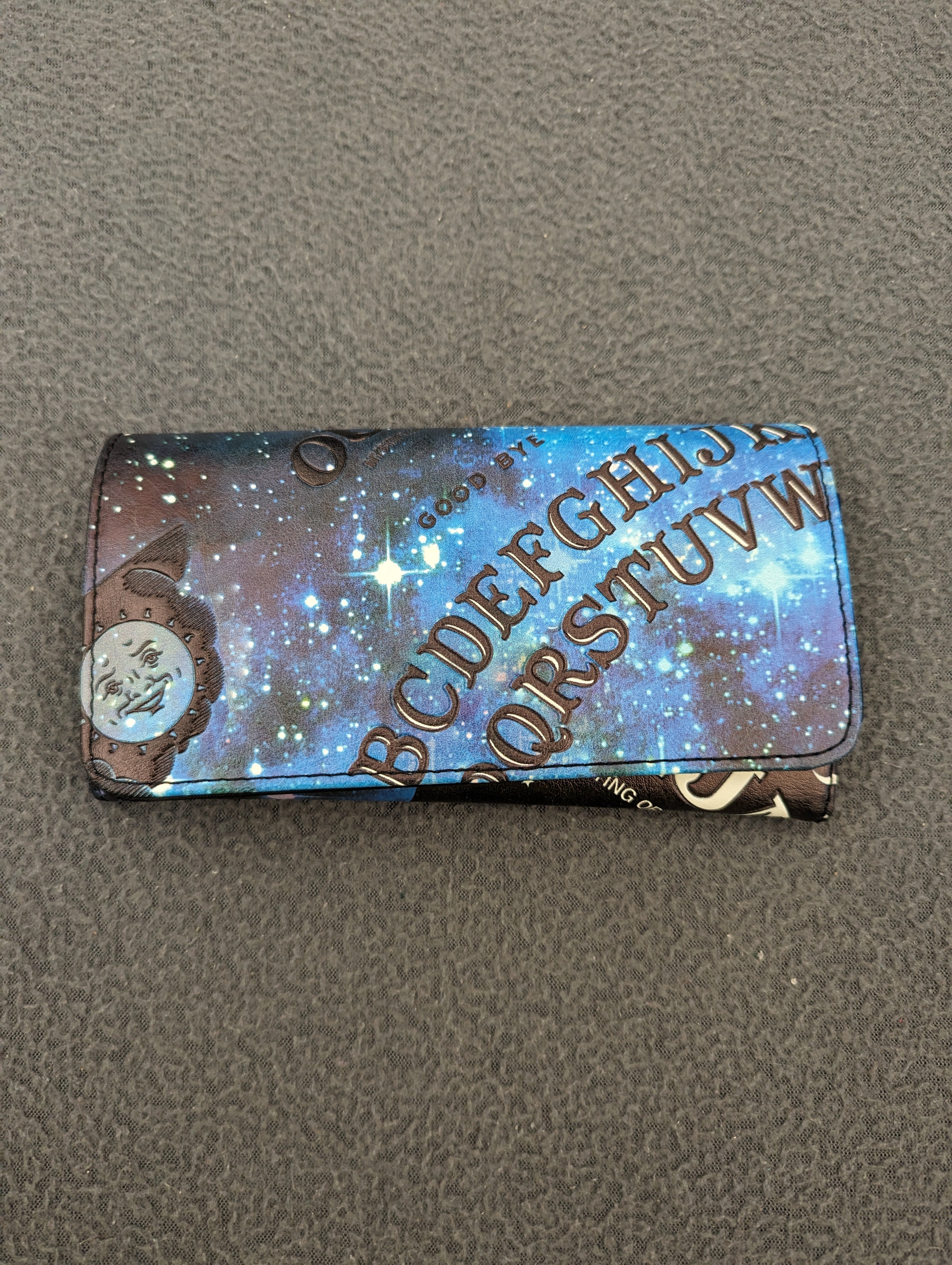 Official Ouija Women's Flap Wallet with Blue Galaxy Space Print