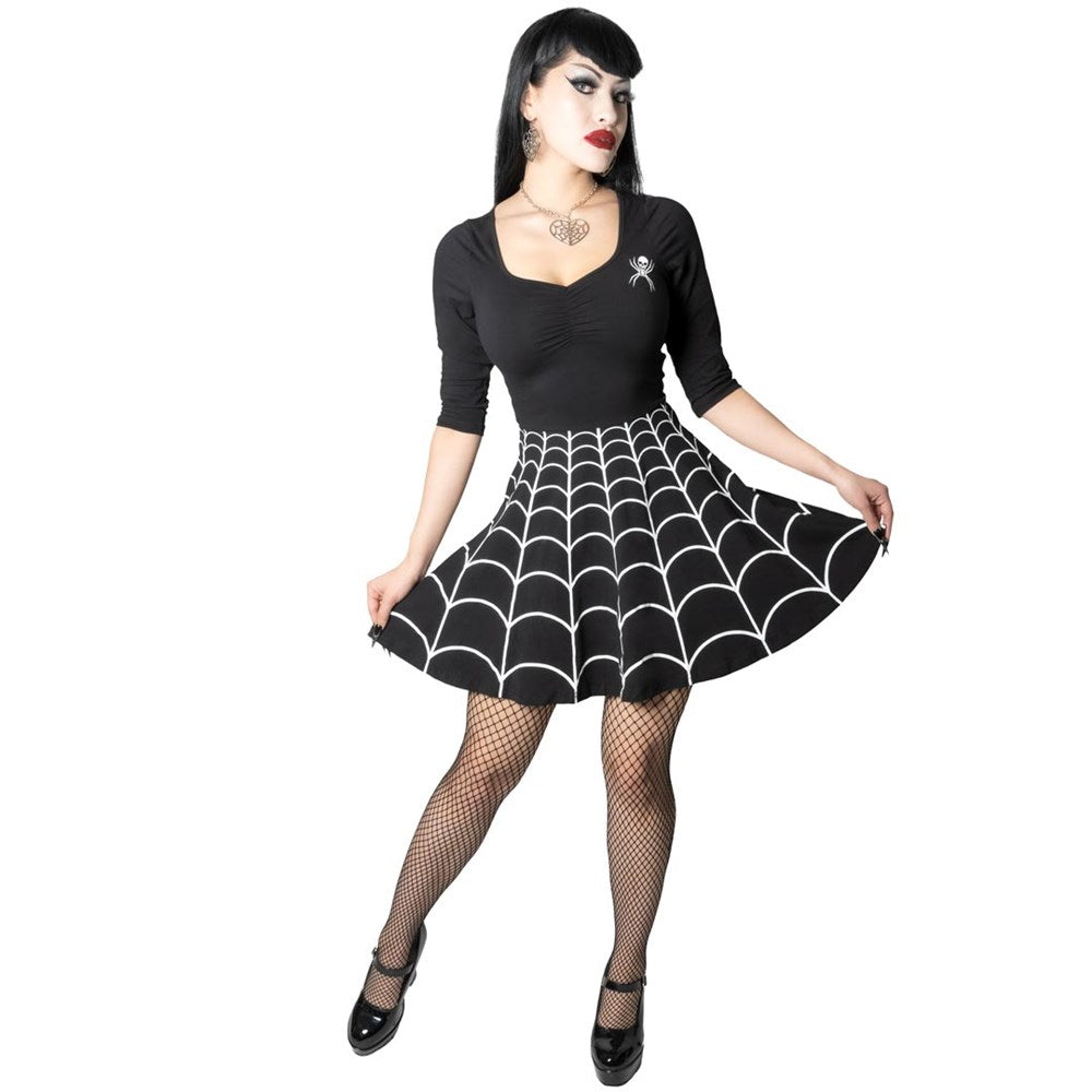 Close up of Kreepsville spiderweb skater dress showing spider chest detail scoop neck and white web pattern skirt