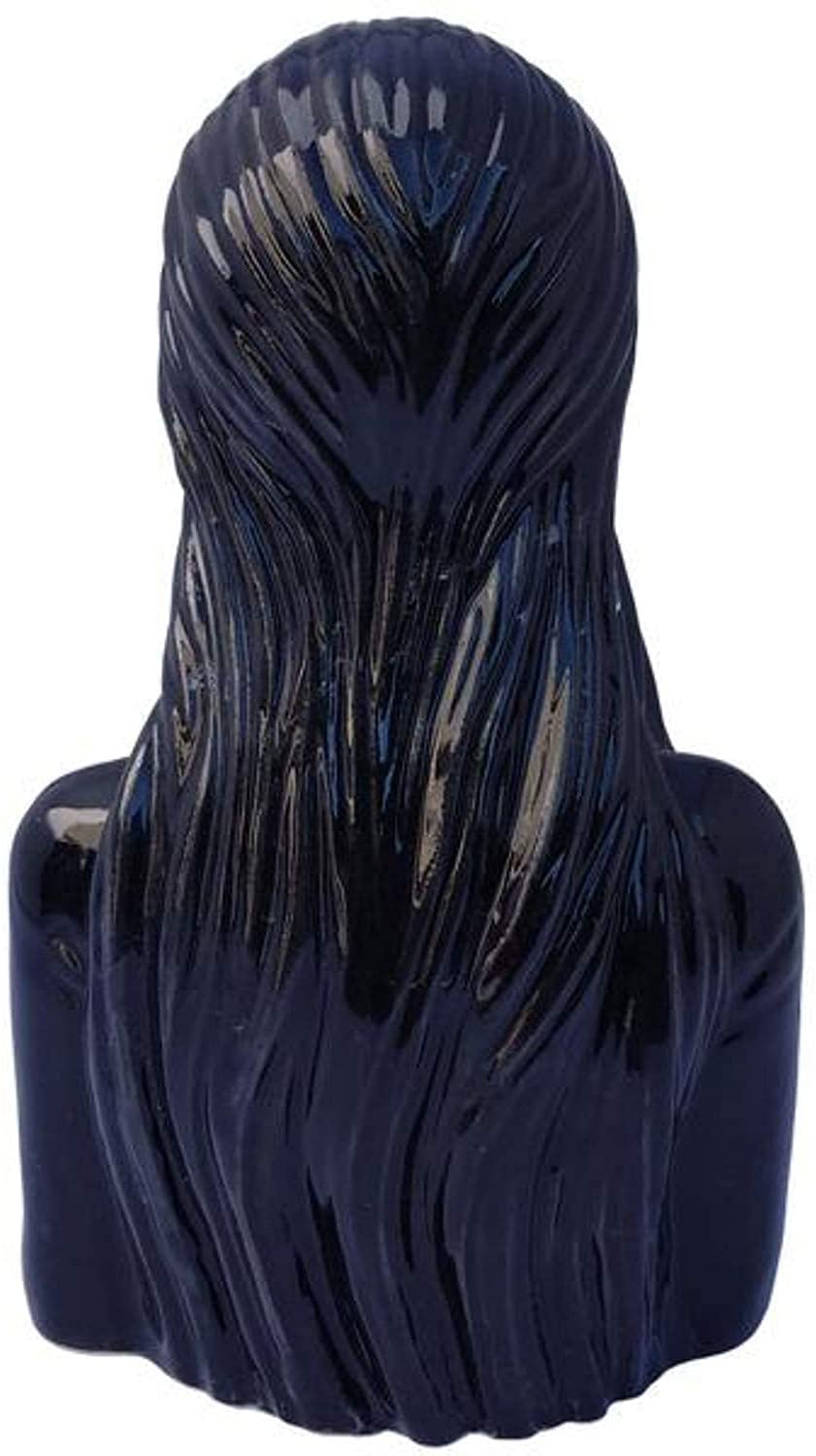 Back side of Elvira Pepper Shaker Set showing the detail of Elvira's hair